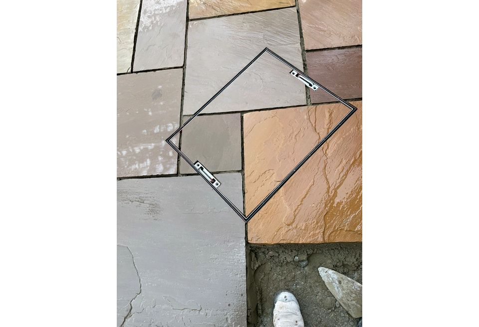 Sandstone Patio - Sandstone Patio - Inset Manhole Cover