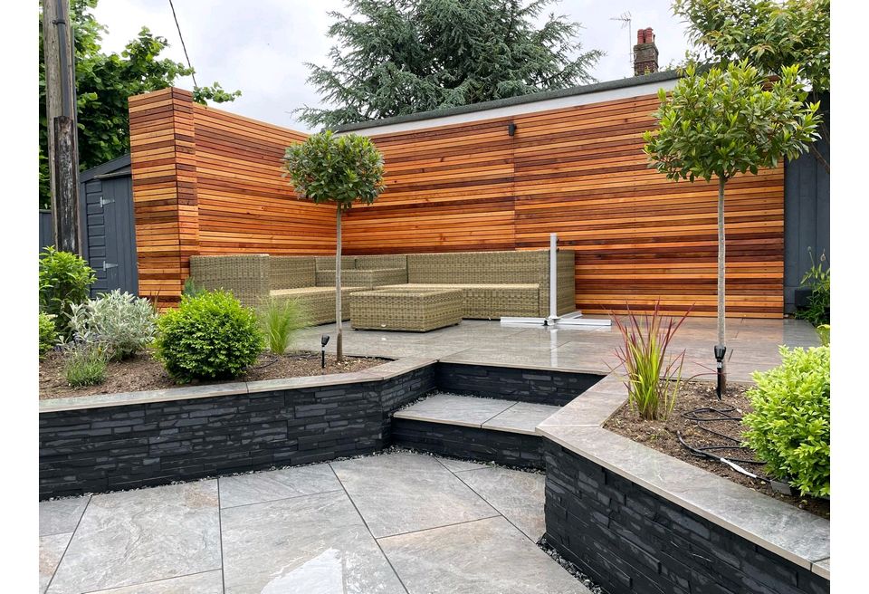 Stepped Rear Garden, Bungay - Stepped Rear Garden Design - New steps and walls were build clad in dry wall porcelain veneers